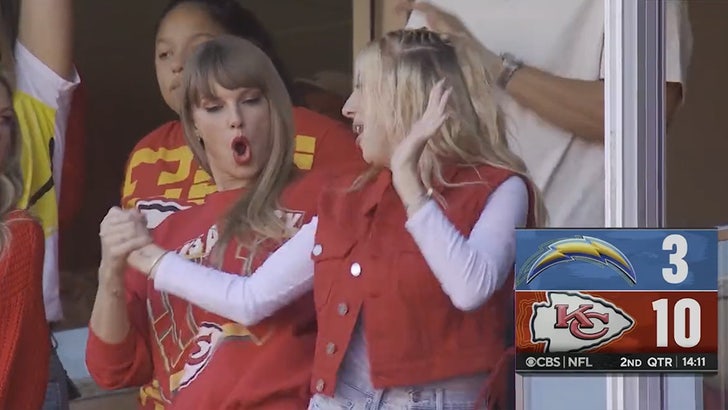 Taylor Swift and Travis Kelce Hold Hands While Leaving Arrowhead Stadium